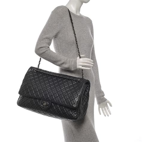 chanel round calfskin bag|Chanel black quilted flap bag.